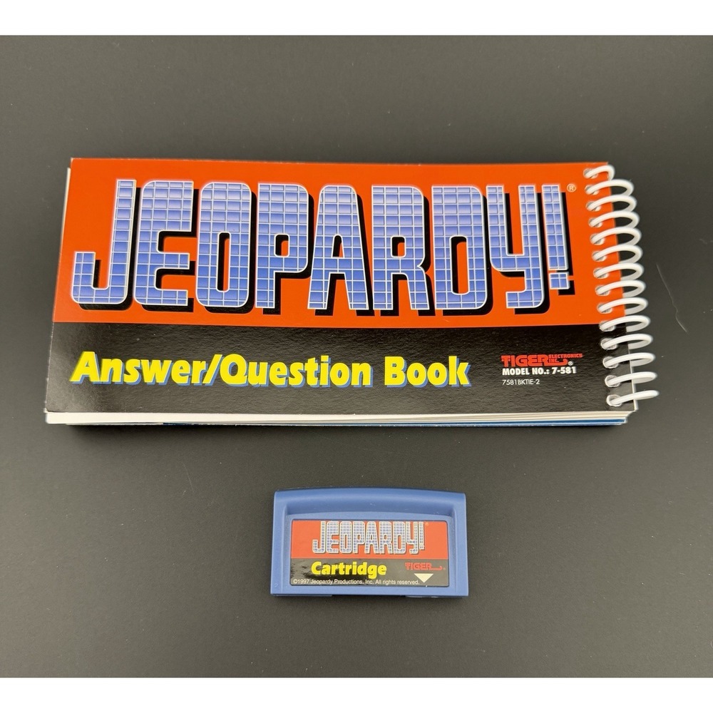 1995 Tiger Jeopardy game answer book and cartridge untested